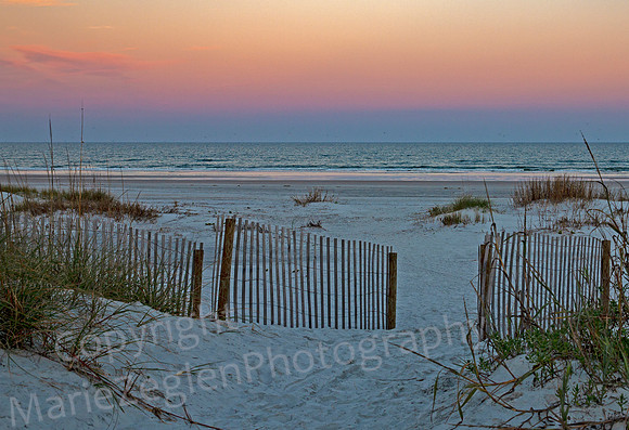 St Augustine Beach Sunset through Fence