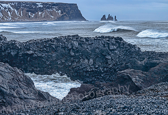 Reynisfara Sea Stacks through Arch